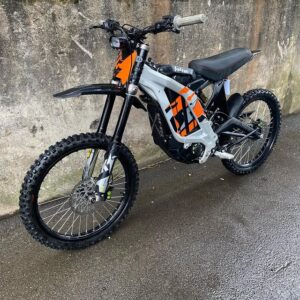 this Orange 2022 Surron LBX for sale—an electric off-road machine built for thrill-seekers, weekend trail riders, and eco-conscious adventurers alike