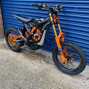 Introducing the orange 2023 surron light bee for sale — a limited edition electric bike that fuses raw power with custom style. Built for thrill-seekers,
