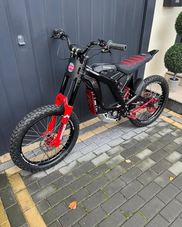 Introducing the red 72v surron light bee for sale – a bold and powerful electric dirt bike engineered for thrill-seekers, urban explorers